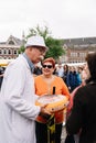 Traditional producers in Gouda Cheese Market a rainy day Royalty Free Stock Photo